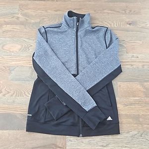 Womens Adidas zip-up with thumb holes.